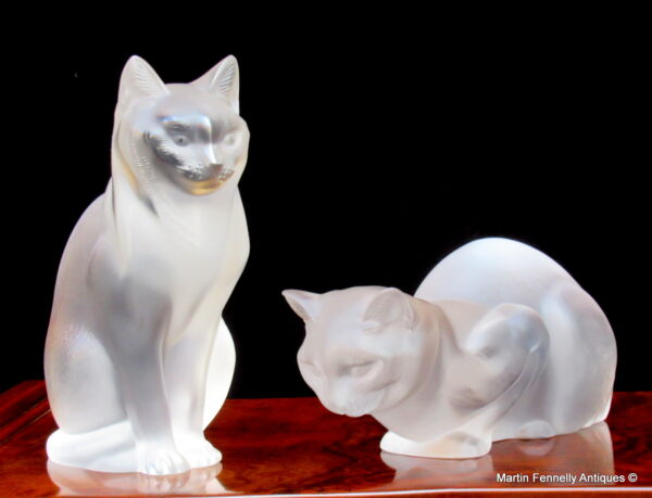 296 Sold René-Jules Lalique (1860-1945) Crouching Cat and Sitting Cat Statuettes